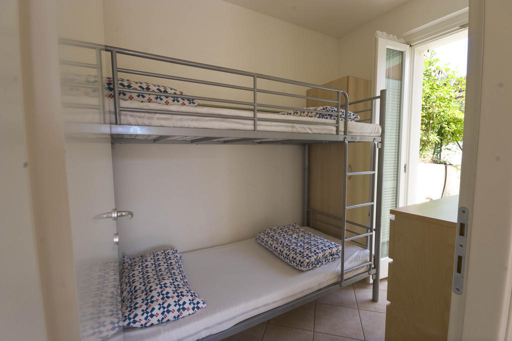 Amarenumana Aparthotel Habitación foto