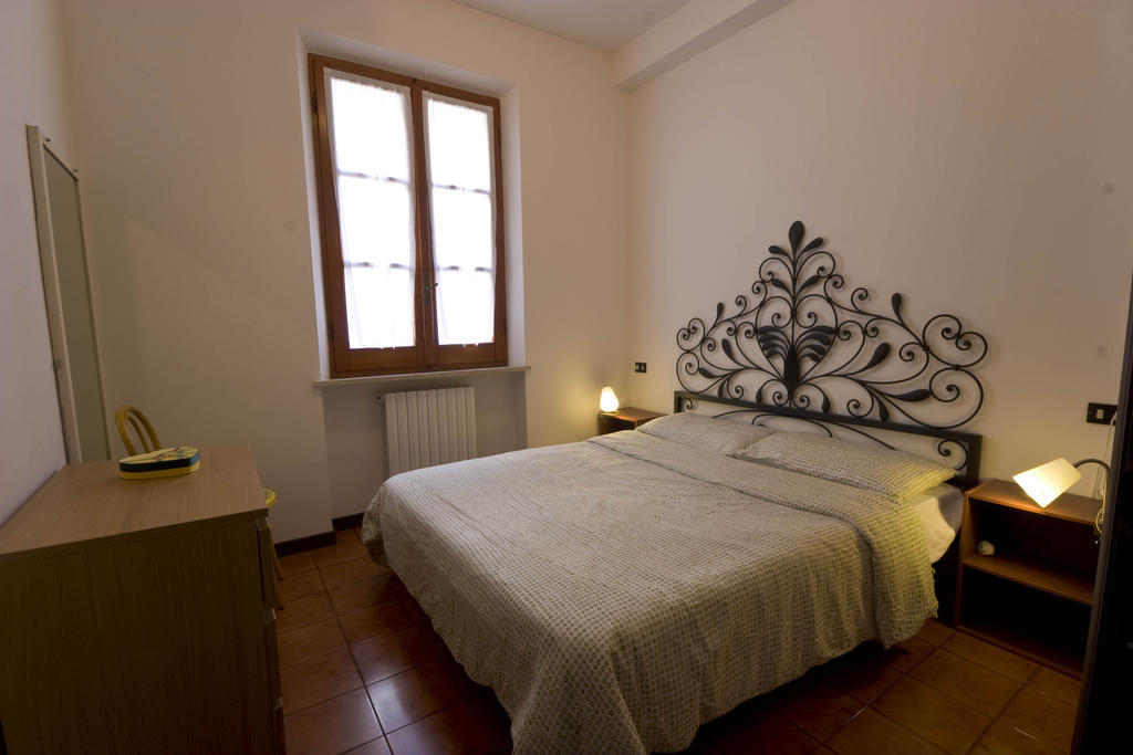 Amarenumana Aparthotel Habitación foto