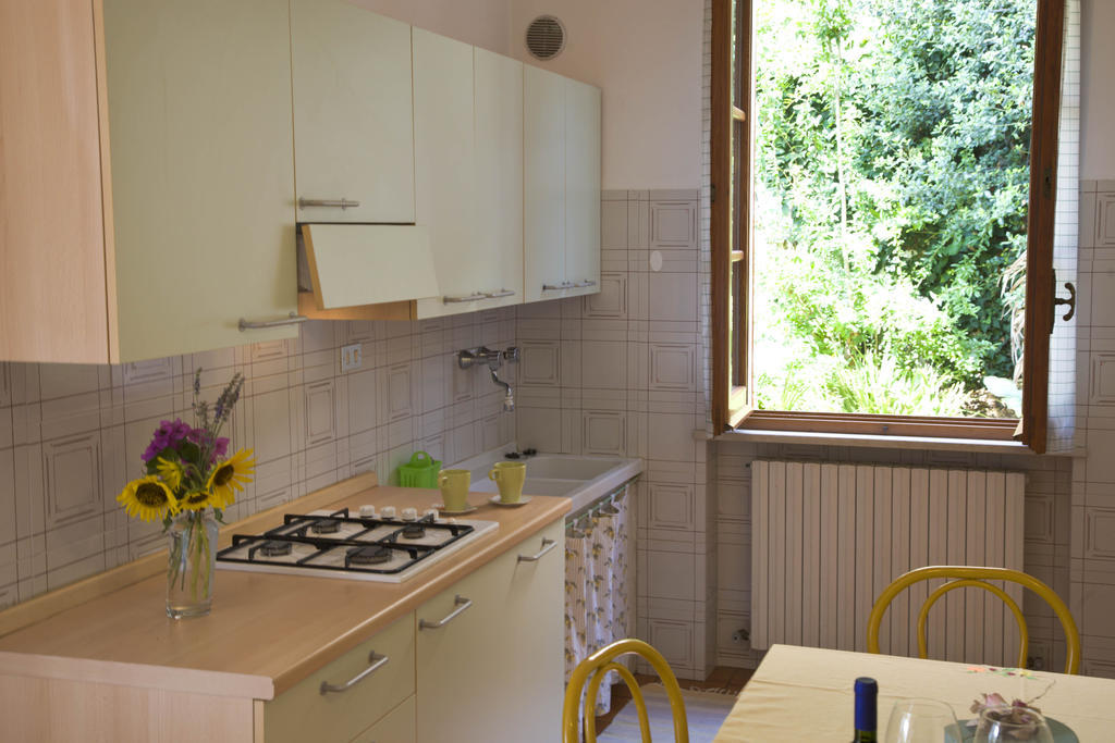 Amarenumana Aparthotel Habitación foto